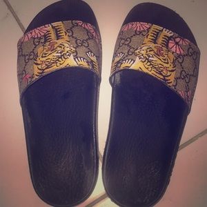 worn, last season’s Gucci slides. Size 3.